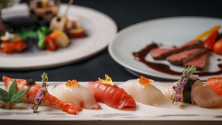 握り寿司8貫と、それとともに提供される彩り豊かな前菜、肉料理。